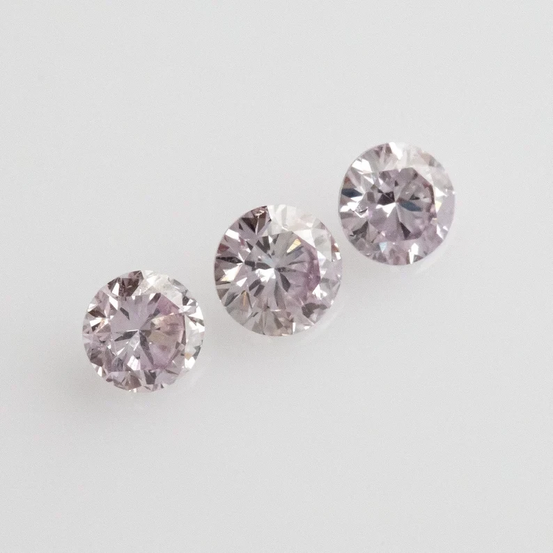 1 pair with center piece Fancy Intense Natural Pink Diamond Set with options