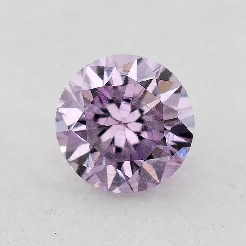2.2mm Fancy Vivid Purplish Pink Natural Pink Diamonds Round Brilliant SI1 0.04ct. Untreated 100% Natural